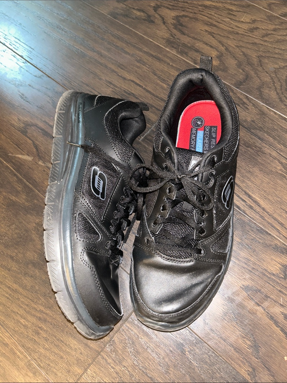 Skechers Men's Black Athletic Lace-Up Sneakers with Red Insole Accent